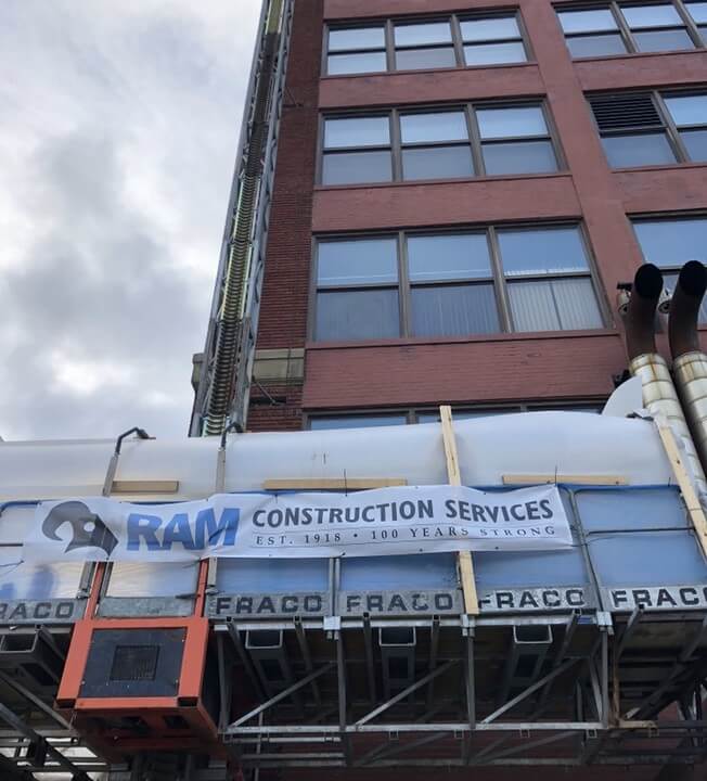 RAM Construction Services is using hydronic heat to keep workers warm on covered scaffolding.